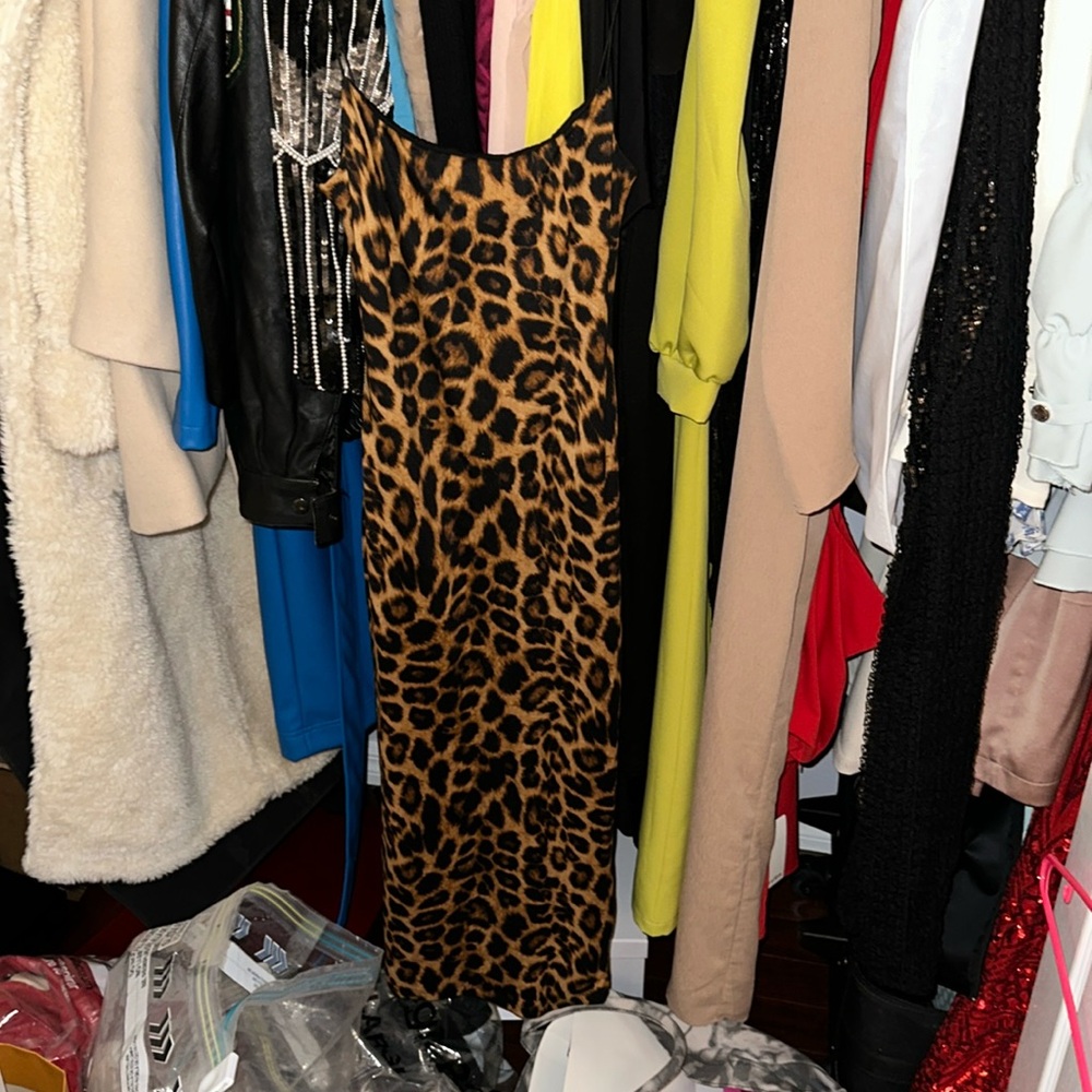 Mob wife dress  by Comme USA. Leopard print w spaghetti straps. Fitted and soft